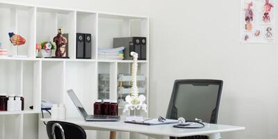 Interior of modern medical office doctor workplace photo