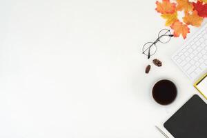 Top view keyboard and coffee cup on office desk. Copy space for your text photo