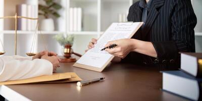 Contract of sale was on the table in the lawyer office the company hired the lawyer office as a legal advisor and draft the contract so that the client could signs the right contract photo