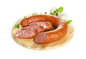 Krakow sausage isolated on white background photo