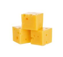 Cheese cubes isolated on white background. With clipping path. photo