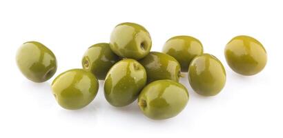 Heap of green olives isolated on white background. Top view photo