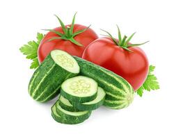 Tomato and cucumber isolated on white background. Salad ingredients photo