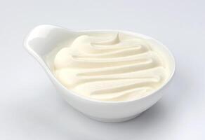 Greek yogurt in bowl on white background photo