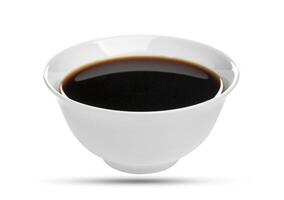 Soy sauce in bowl isolated on white background, with clipping path photo