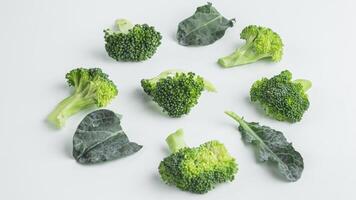 broccoli cut into small pieces on a white background photo