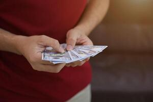 Money dollar bill with hand photo