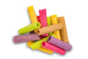 Top view pile of colorful homemade wafer tube isolated on white background with clipping path. photo