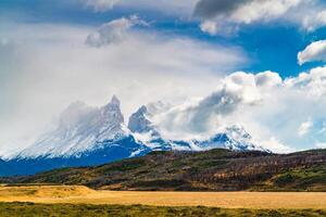 Landscape with snow capped Cuernos Del Paine mountain at Torres del Paine National Park in Southern Chilean Patagonia, Chile photo