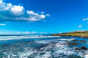 View of waves in the Pacific Ocean at Easter Island in Chile photo