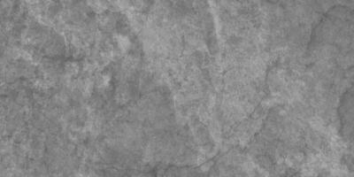 Seamless polished dark concrete floor or old grunge texture, old vintage charcoal black chalkboard or blackboard, Dark wallpaper grunge texture copy space, Texture of a grungy black concrete. photo
