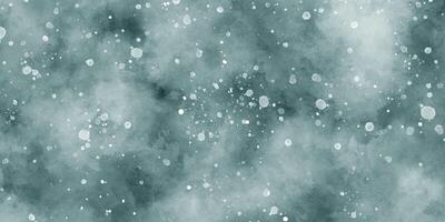 Beautiful winter background of snow floating into air randomly, light blue bokeh background for wallpaper, abstract sky blue cloudy watercolor background with bubbles and watercolor stains. photo