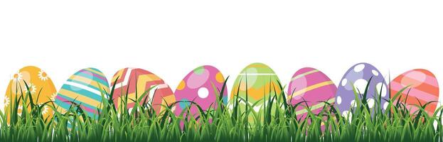 Easter eggs in green grass. Vector graphics