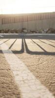 Empty beach car park spaces covered in asphalt. video