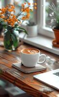 AI generated Cup of coffee stands on wooden table next to laptop and notebook photo