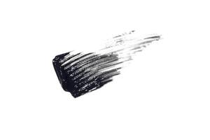 swatch, mascara brushstroke smear isolated on white background black mascara texture photo