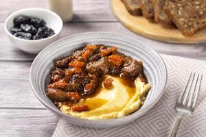 Beef goulash with mashed potatoes. photo