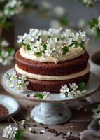 AI generated Chocolate cake with cream cheese frosting and spring flowers on cake stand. photo