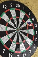 Dart in the Center of a Bullseye photo