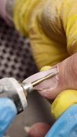 The process of manicure in the cuticle area. A manicurist polishes a nail plate. video