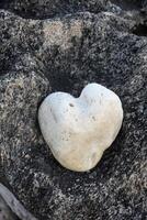 Rounded White Natural Heart Shaped Stone photo