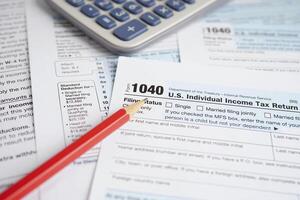 Tax form 1040 U.S. Individual Income Tax Return, business finance concept. photo