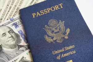 US passport with USA dollar money, American citizen in United States of America. photo