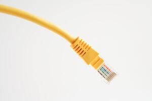 Ethernet cable for connect to wireless router link to internet service provider network. photo