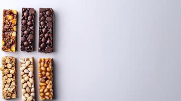 AI Generated Assorted Chocolates and Nuts on White Surface photo