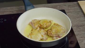 Chicken fillet is fried in a frying pan in boiling oil video