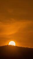 Timelapse of dramatic sunrise with orange sky in a sunny day. video