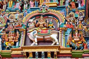 Sculptures on Hindu temple tower photo