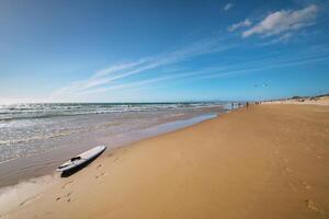 Atlantic ocean beach at Fonte da Telha beach, Costa da Caparica, Portugal photo