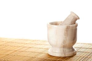 Marble mortar with pestle photo