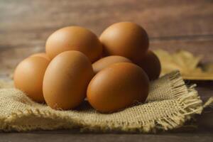 fresh eggs on a burlap cloth photo