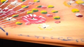 Decorated hand fan with flowers and made in wood gyrating video