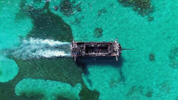 Pirate ship floating in caribbean sea. Dominican Republic. Aerial top view video