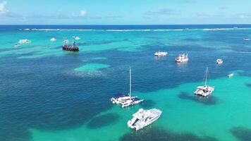 Pirate ship floating in caribbean sea. Dominican Republic. Aerial top view video