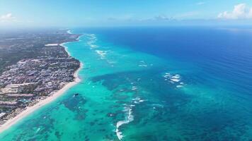 Hotels and the beach in Caribbean sea, Punta Cana resort, aerial drone view video