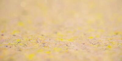 Yellow and beige background with thin focal part and defocus lights. Abstract background. photo