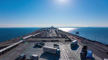 A timelapse of traffic jam on the highway at Tokyo bay area in Chiba wide shot tilt video