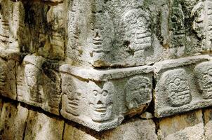 Tzompantli detail at Chichen Itza, Wonder of the World photo