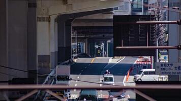 ein Zeitraffer von der Verkehr Marmelade beim das Stadt Straße im Tokyo Tele Schuss Neigung video