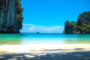 Aerial panorama of Thailand's verdant, lush tropical island, National Park Island, with blue and aquamarine the sea, and clouds shining by sunlight in the background. photo