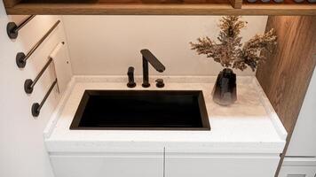 Laundry roombuilt in white alternating wood simple and elegant. photo