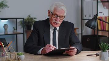 Senior business man director having interview job discussion, video conference call at home office