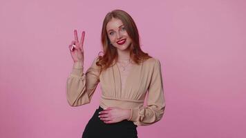 Businesswoman girl showing victory sign, hoping for success and win, doing peace gesture, smiling video