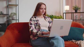 Sad young woman use laptop computer pc browsing, loses becoming surprised sudden bad lottery results video