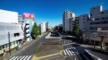 een timelapse van de verkeer jam Bij de kruispunt in tokyo breed schot video