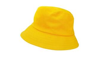 Yellow bucket hat isolated on yellow background. photo